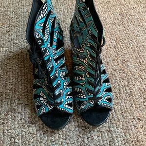 Hand painted, one of a kind shoes.